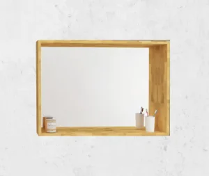 מראה מיוחדת מעוצבת עם מסגרת מלבן בוצ׳ר שיוצרת מדף