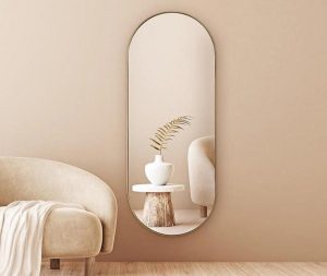 מראה קפסולה זהב